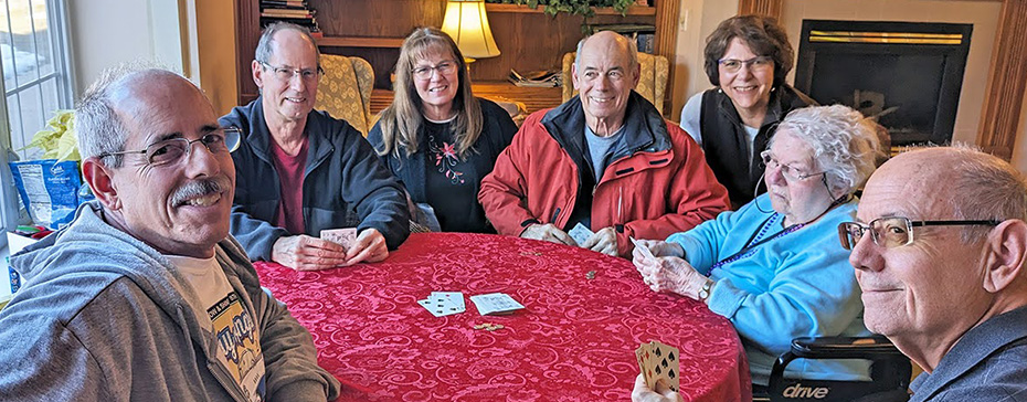 Resident Ruth and her family played a rousing game of cards in February