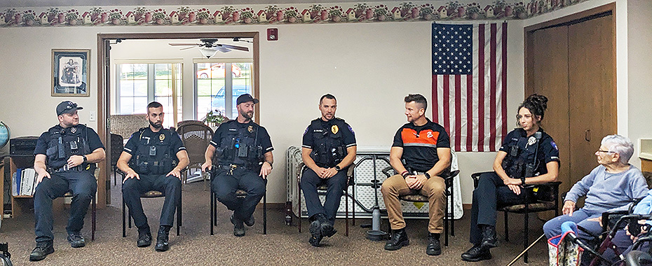 CrestRidge residents welcome police officers for National Coffee with a Cop Day