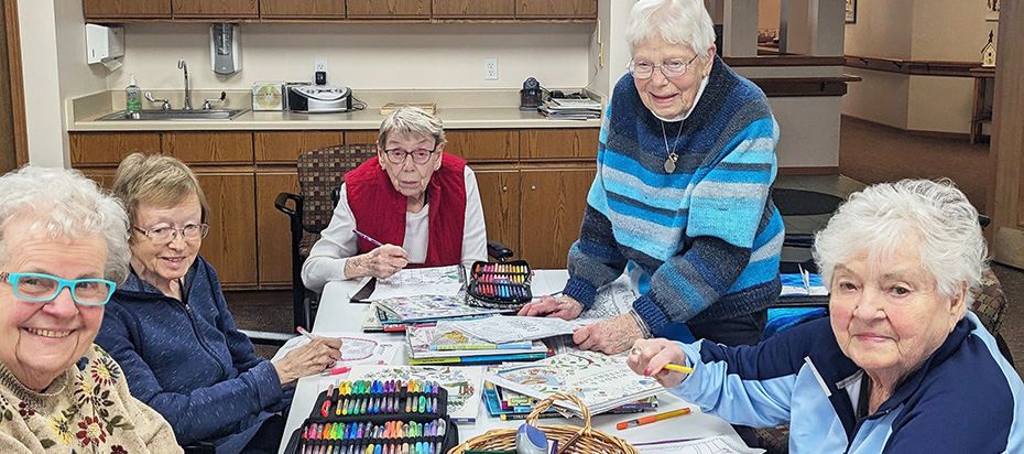 CrestRidge ladies making a coloring project
