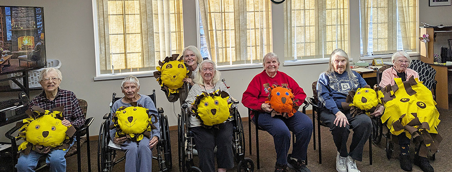The Dodgeville Women's Art Club brought adorable lion pillows for all.